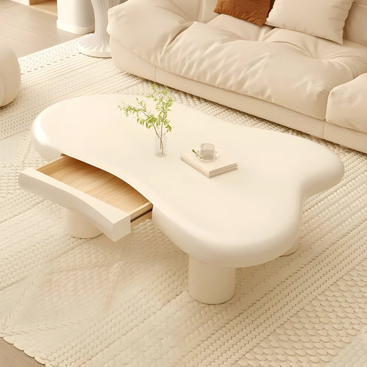 طاولة قهوة بتصميم انسيابي ودرج خفي